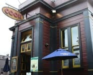 Logo for The Cook - Cafe & Bar